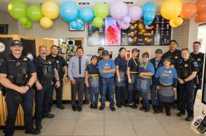 Tulsa Police officers connect with local families during Coloring with a Cop event